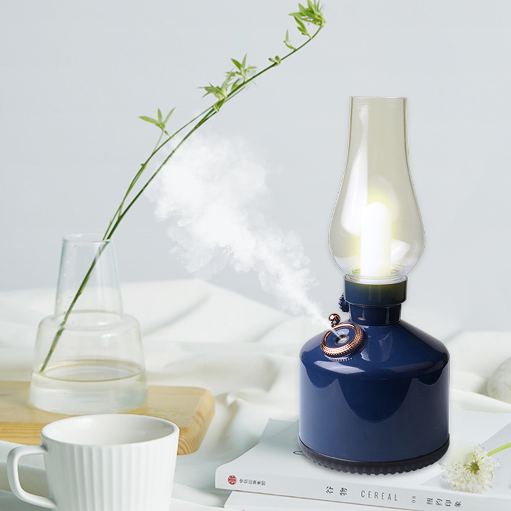 Internet celebridad Nueva lámpara de queroseno humidificador hogar mini pequeño humidificador ultrasónico de purificación de aire de mano