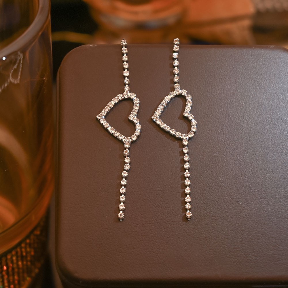 S925 aguja de plata elegante borla pendientes de alta gama simple cara de adelgazamiento pendientes de todo fósforo estilo coreano nuevos pendientes de moda al por mayor