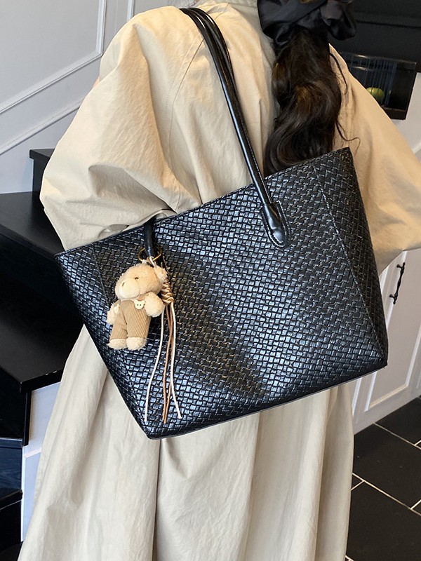 Bolsa de moda retro de gran capacidad para mujeres 2025 nueva bolsa de hombro transfronteriza simple textura casual bolso de abrigo