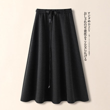 黑色毛呢半身裙女秋冬季2025新款设计感宽松加厚a字褶皱大摆伞裙