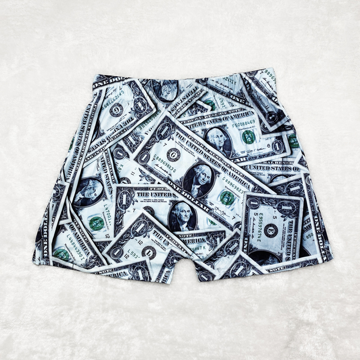 US $-2