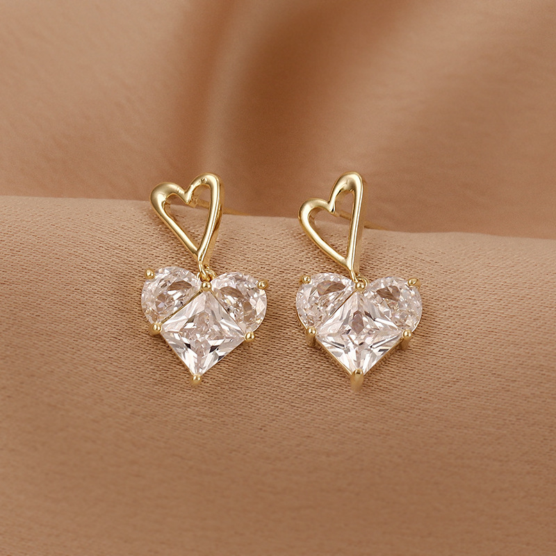 Korean hollow heart-shaped earrings wholesale