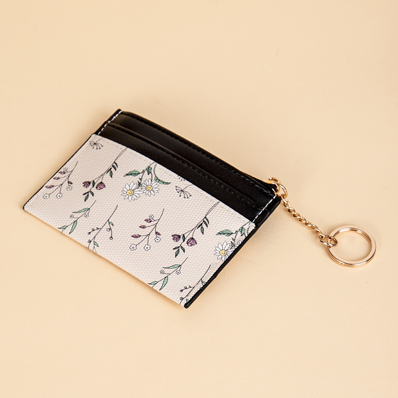 Versión coreana de la nueva billetera de tarjeta pequeña para mujer, 30% de descuento, lindo estampado de dibujos animados, paquete de tarjeta plegable de posición de múltiples tarjetas para estudiantes