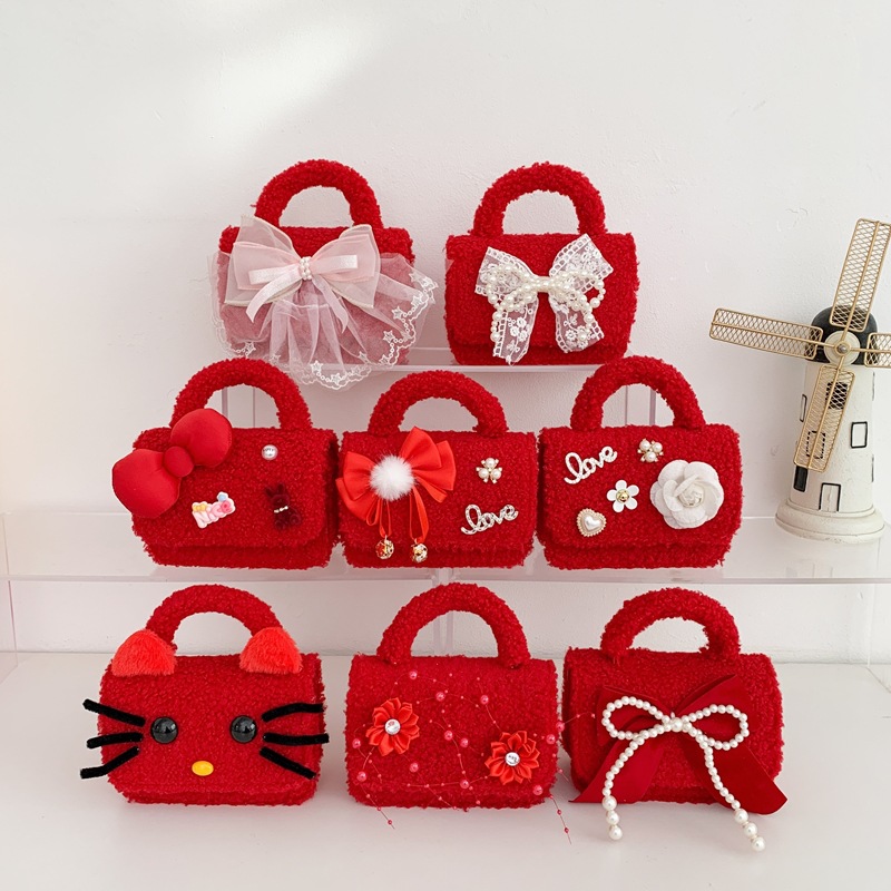 2026 Año Nuevo de primavera bolsos rojos para niños lindos bolsos de peluche mini arco bolsos de cadena de niña