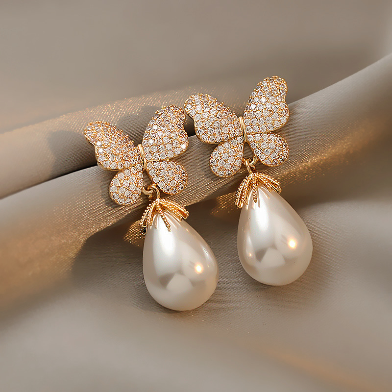 Nihaojewelry Moda Perla Diamante Mariposa Pendientes Joyería Al Por Mayor display picture 1