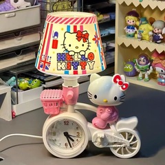 国境を越えたスポットアニメ少女の小夜灯は電気目覚まし時計の電気スタンドのledランプの寝室のかわいいベッドのヘッドライトを挿します。