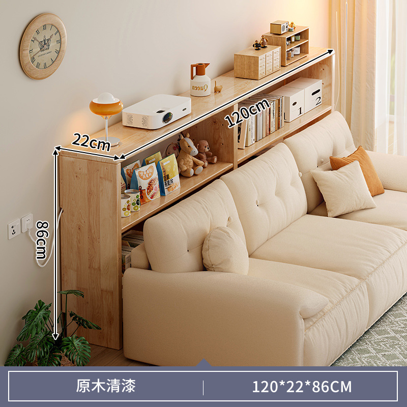 木製のソファーの後ろの棚の長い棚は壁に寄りかかっています。|undefined