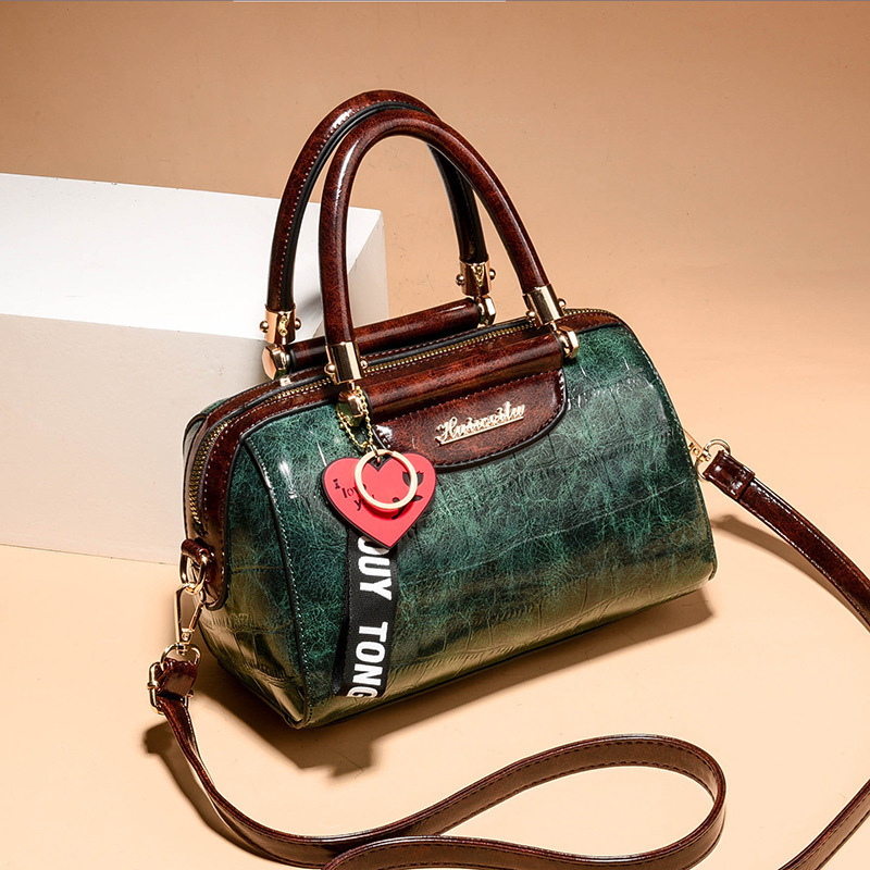 Bolso de textura 2025 nuevo bolso de hombro con diseño de patrón de piedra, bolso de mensajero universal de asistencia informal, bags transfronterizos