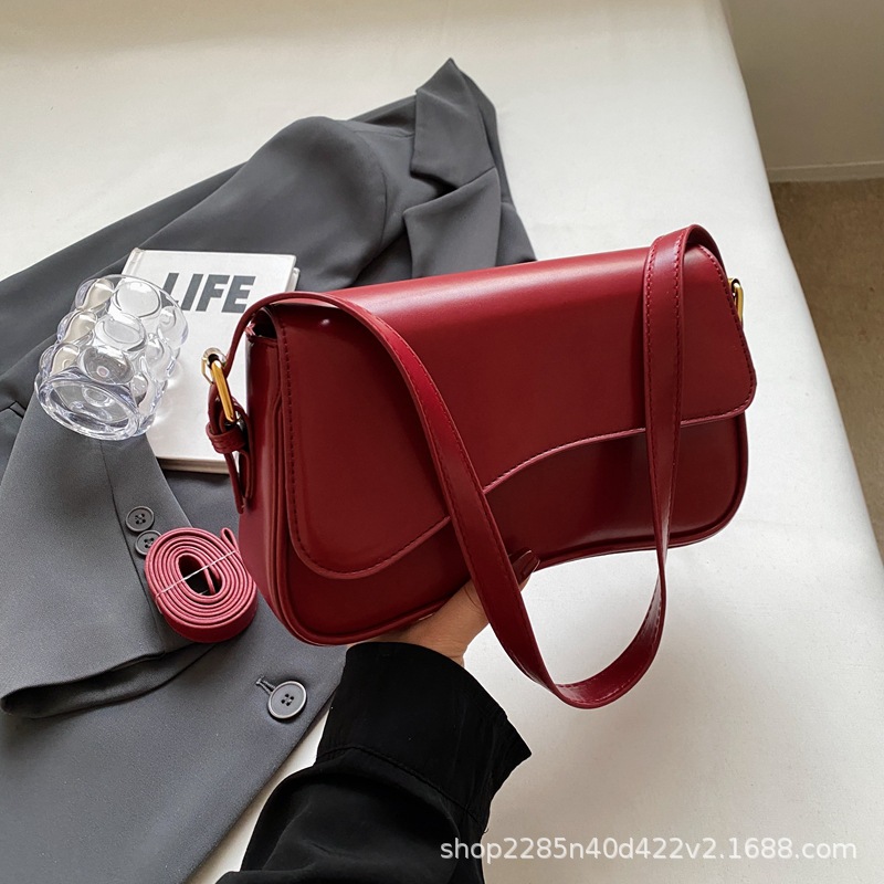 Bolso de hombro con hebilla magnética de nuevo estilo de alta calidad para viajar al trabajo, bolso de mujer simple de moda, bolso de axila, portátil diagonal