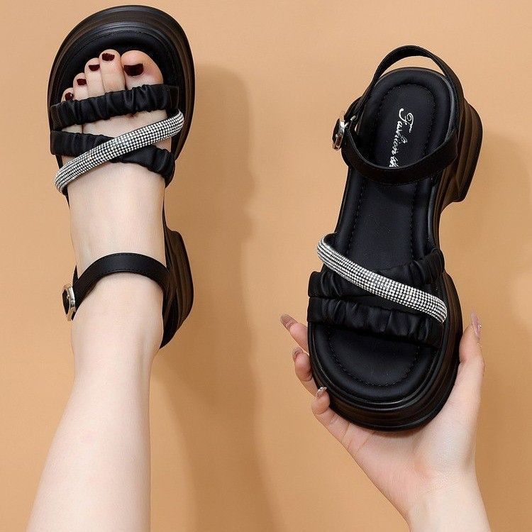 Sandálias de suela gruesa para mujeres de verano 2026 nuevo estilo de hadas aumentó la altura de los zapatos romanos de suela suave, zapatos de playa.
