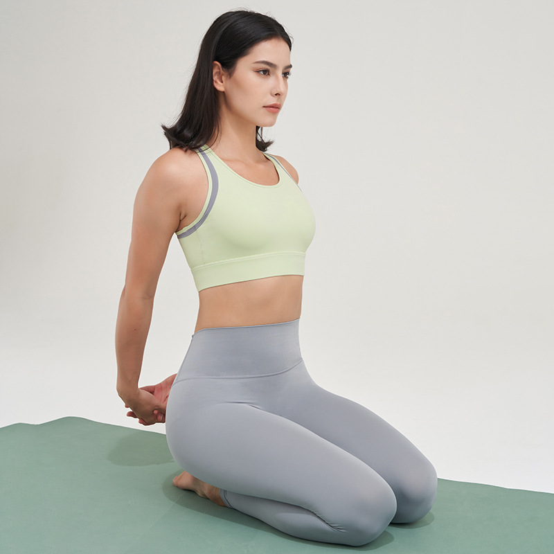Ropa interior deportiva fija chaleco sin costuras cojín del pecho belleza sujetador integrado sin anillo de acero nuevas mujeres al por mayor