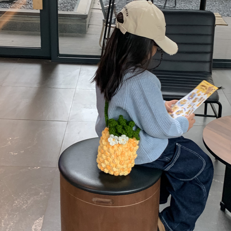 Caricatura lindo piña estilo de niños y niñas bolsas de cubo de agua gancho de aire extranjero fruta mochila nuevo mini bolso para niños
