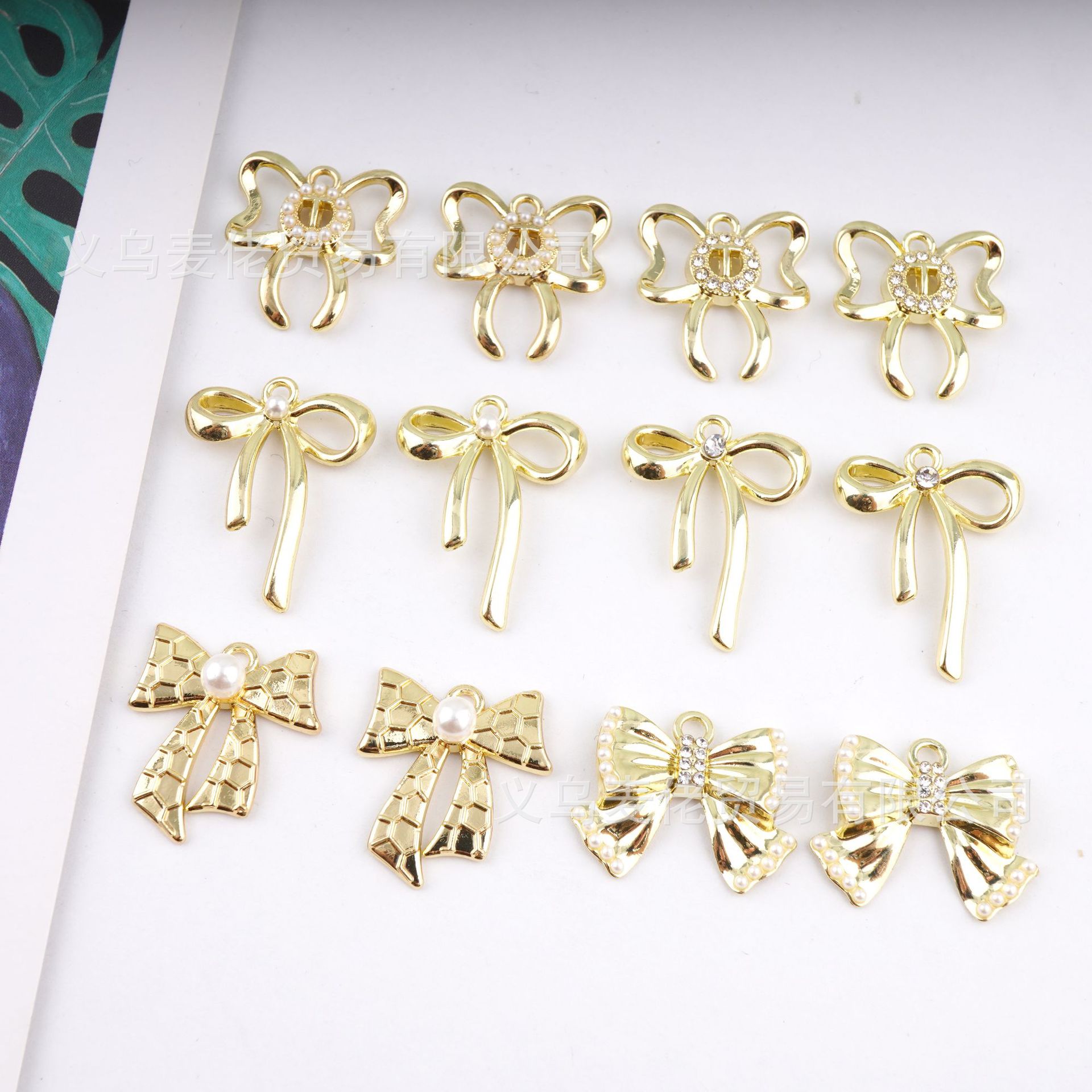 Golden bow earrings pendant diy hand-made materials wholesale alloy jewelry accessories manufacturers wholesale