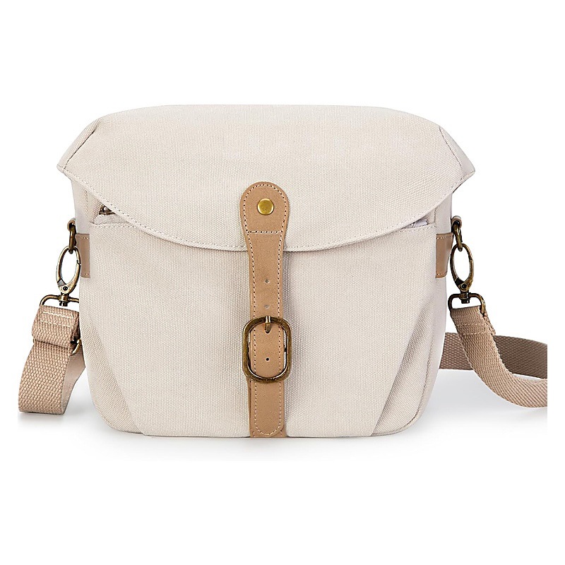 Amazon's new lightweight crossbody camera bag, featuring multiple compartments for photography equipment, is a versatile backpack suitable for DSLR and digital cameras