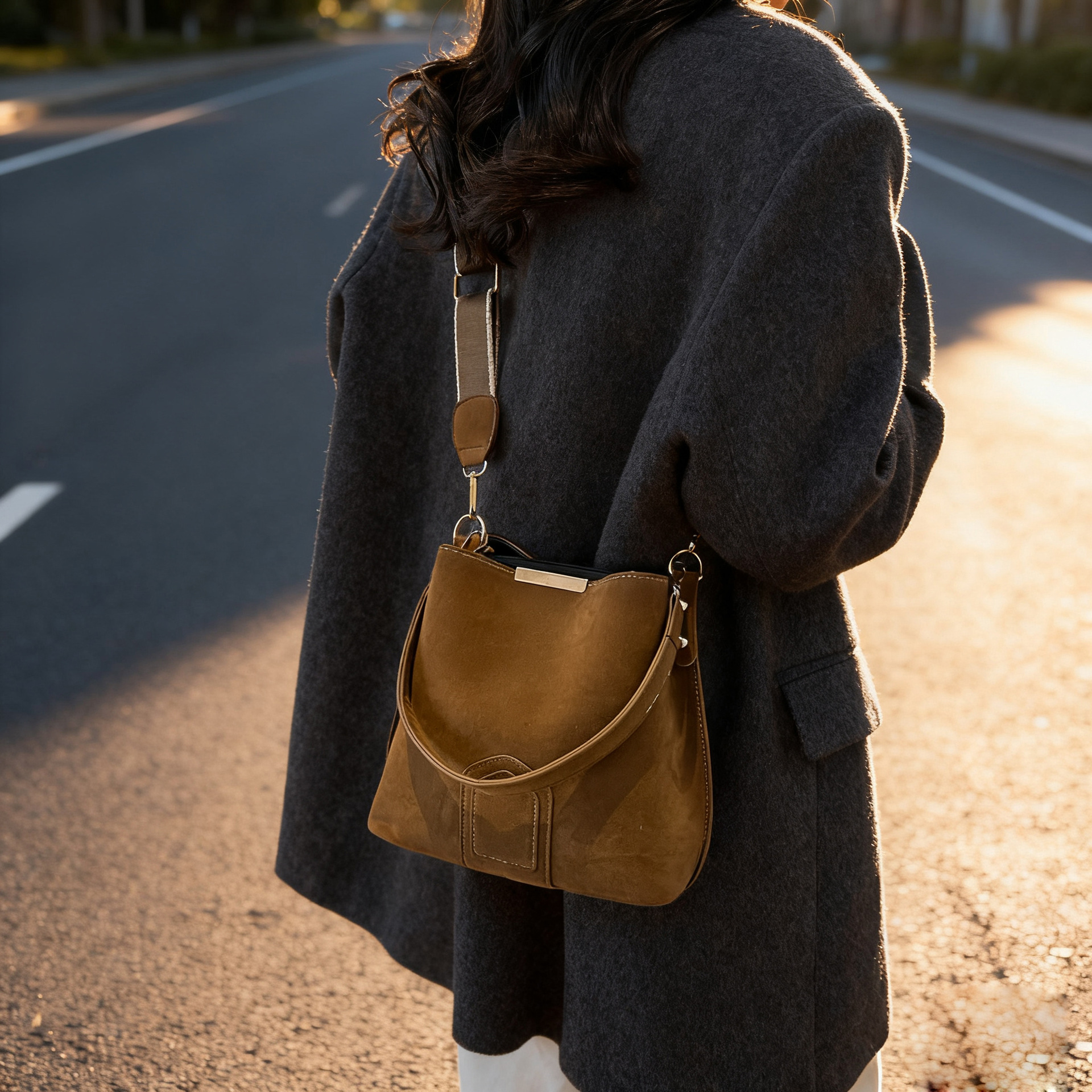 Bolsa de textura de alta calidad para mujeres 2025, otoño y invierno, nuevo bolso de cubo retro, moda extranjera, mochila de viaje universal.