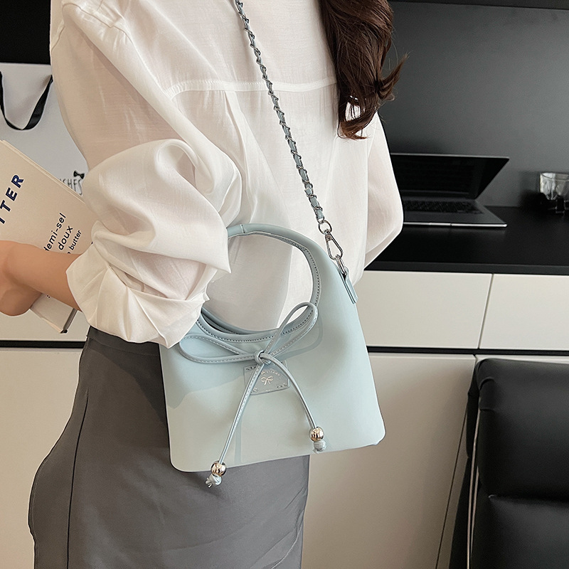 Bolso de moda coreano 2025 nuevo bolso de cadena bolso de hombro con textura esmerilada bolso de mensajero con lazo lindo