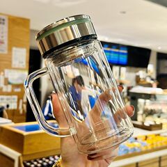 卸売りは取っ手の二重のグラスを持って蓋をして高温に抵抗するコップの大容量の高ホウ素のシリコンのコップをかぶせて印字することができます。