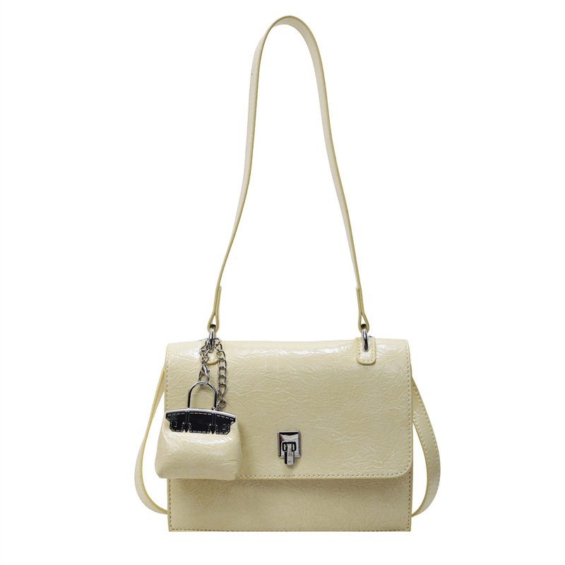 Bolso de textura transfronteriza 2025 primavera y verano nuevo bolso femenino bolso de hombro con patrón de agarre de mano de alta gama bolso de mensajero simple y versátil