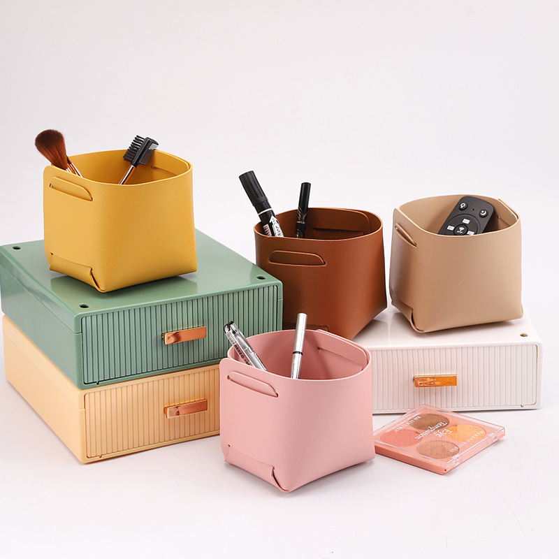 Simple, multi-functional cosmetic organizer box: foldable, leather-like, waterproof, dirt-resistant entryway storage basket for small items.