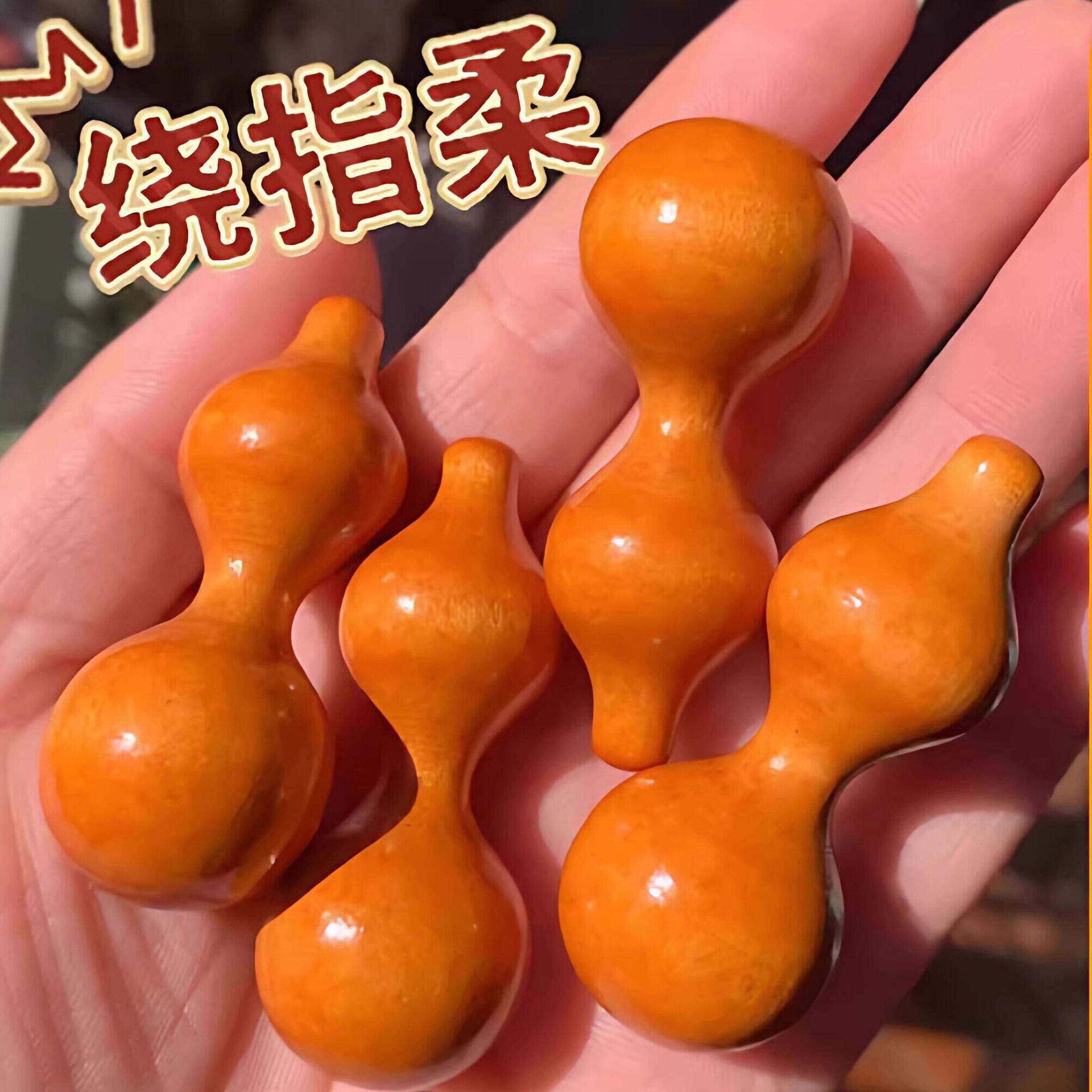 A delicate gourd with a slender waist, soft to the touch, a cute handheld toy for stress relief.