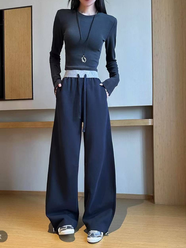 衛のズボンの女性の2025春の新型の雪の花の灰色の百合はやせている運動の風が高くて腰のまっすぐな筒のカジュアルなバナナのズボンをつなぎ合わせます。|undefined