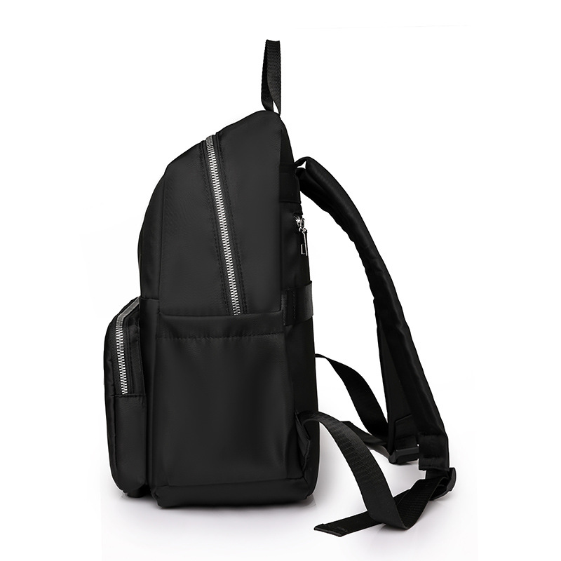 2024 verano nuevo estilo casual damas mochila de nailon simple y versátil mochila de computadora de gran capacidad para estudiantes al por mayor