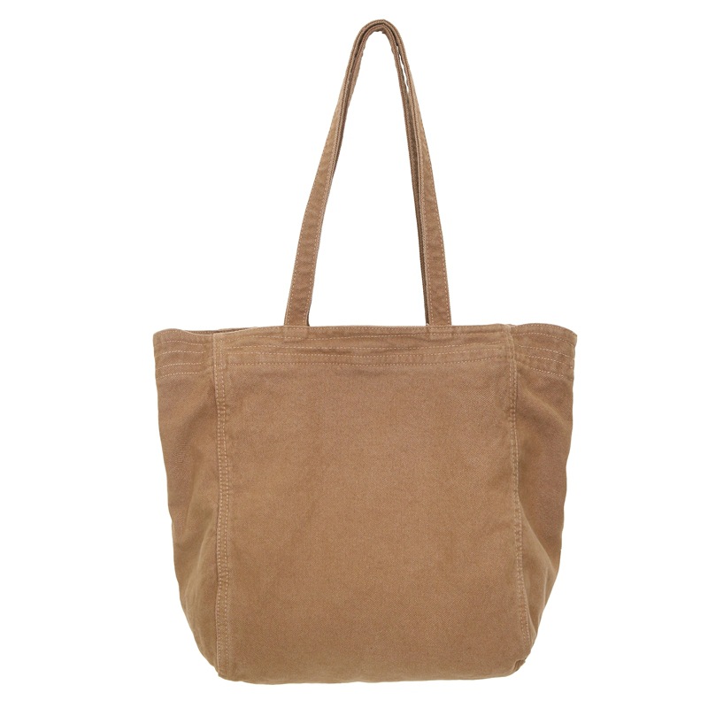 Bolso tote de lona de color sólido retro de gran capacidad de viento perezoso 2025 nuevo bolso de hombro simple de moda al por mayor