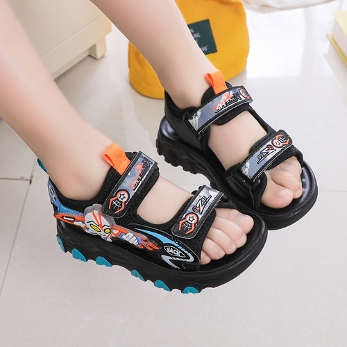 Factory direct supply of Ultraman Sandals for Boys  Summer New Luminous Soft Sole Baby Sports Running Beach Shoes
