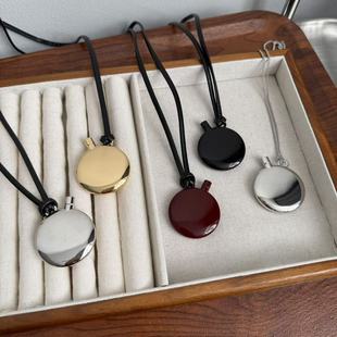 South Korea Metal Personalized Large Flat Wine Jug Black Leather Rope Perfumery Bottle Gloss Paint Long Pendant Woolen Chain New
