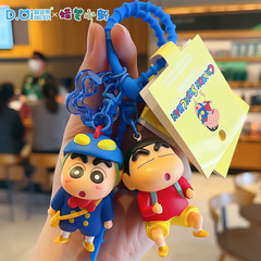 正規版のクレヨンしんちゃんの動感のスーパーマンの公仔のキーホルダーはかわいい漫画のかばんのキーホルダーを掛けて卸売りを飾ります。