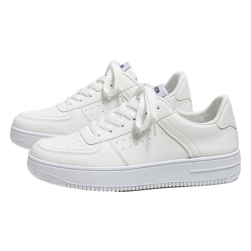 Zapatos de skate para hombres primavera 2026 nuevos zapatos de red deportivos casuales transpirables tendencia juvenil universal color sólido zapatos blancos para hombres