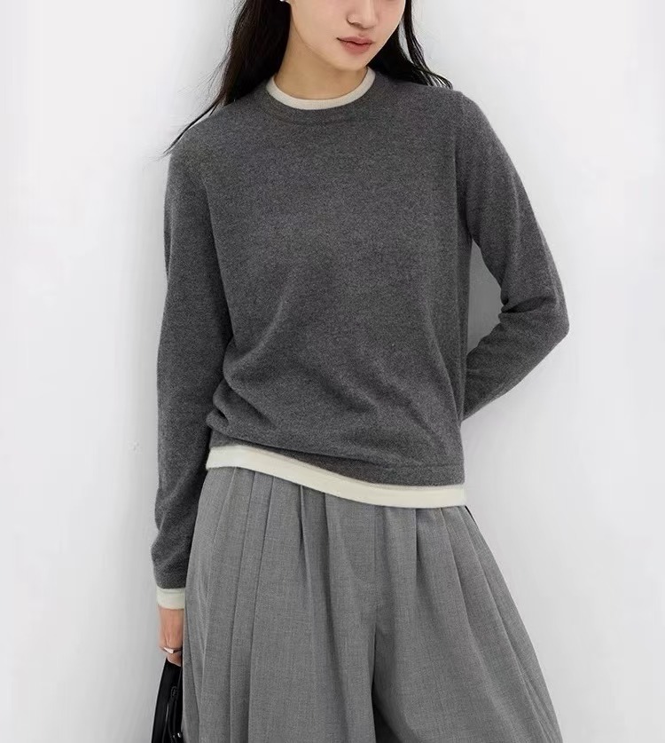 色の偽の2つの丸首のカシミヤのニットの底のシャツの女性の秋冬の怠惰な高級感の灰色のセーターの中で上着を掛けます。