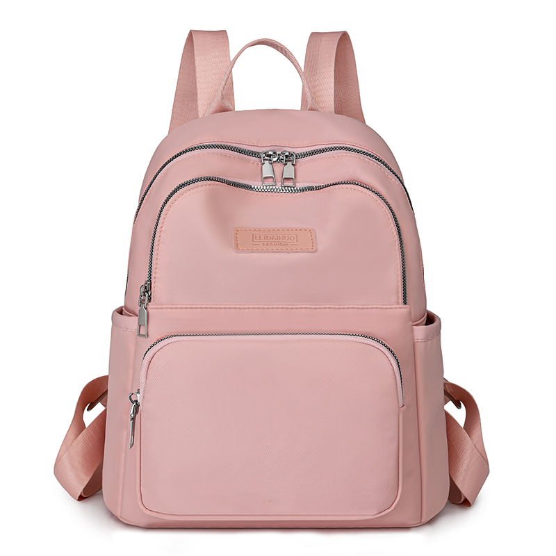 2024 nueva mochila de nylon para mujer, bolso de tela de todo fósforo de estilo coreano de moda, mochila pequeña para madre de viaje de ocio ligero