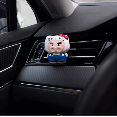 Cartoon pig car air freshener, KT cat car air vent accessory, decorative perfume ornament, diffuser stone, cute cross-border product (Car Perfume Aromatherapy) - left-door-guard-head-with-essential-oil