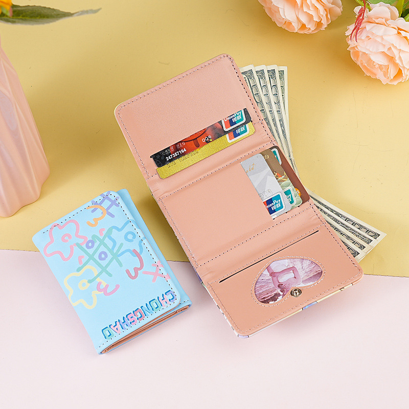 Nuevo estilo simple graffiti de color corto nicho lindo diseño de mujer plegable compacto multi-tarjeta cartera triple plegable