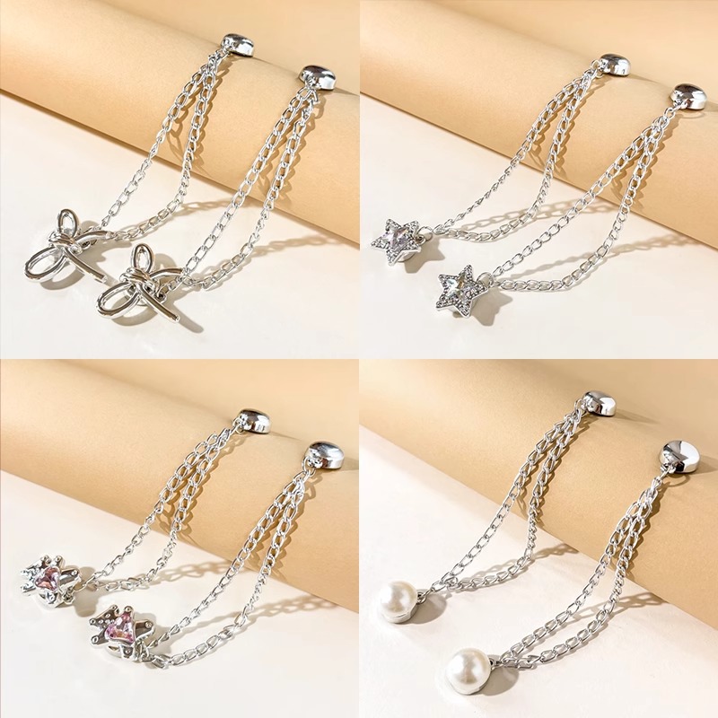 Esquina de la camiseta, peldaño apretado, artefacto corto, botones de nudos, mangas fijas, pantalones fijos, pies, cadena anti-flip, botones de succión magnéticos