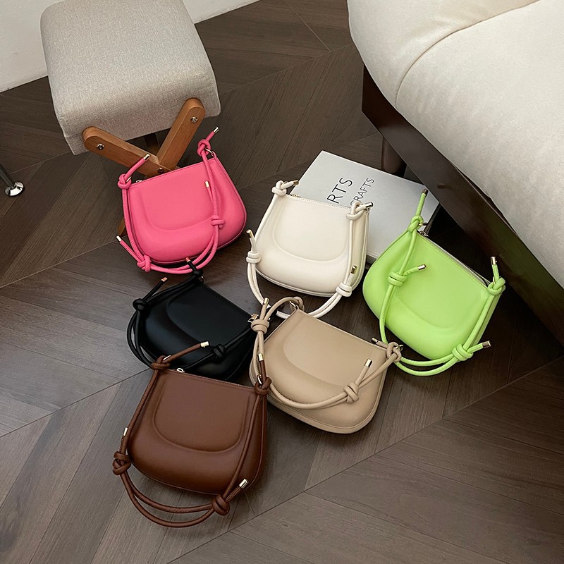 Textura color caramelo nuevo bolso femenino portátil moda moda bolso de hombro estilo occidental bolso de axila simple bolso de silla dulce