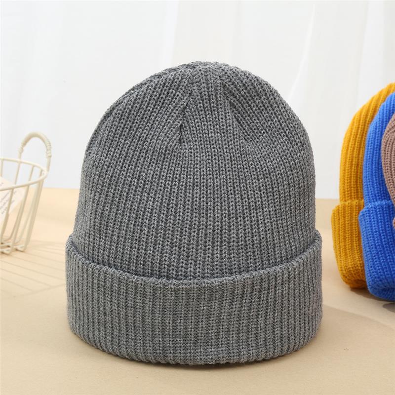 Diseño sombrero de punto sombrero de lana de otoño y invierno sombrero de protección de orejas caliente sombrero de cabeza con LOGO sombrero frío a prueba de viento para hombres y mujeres