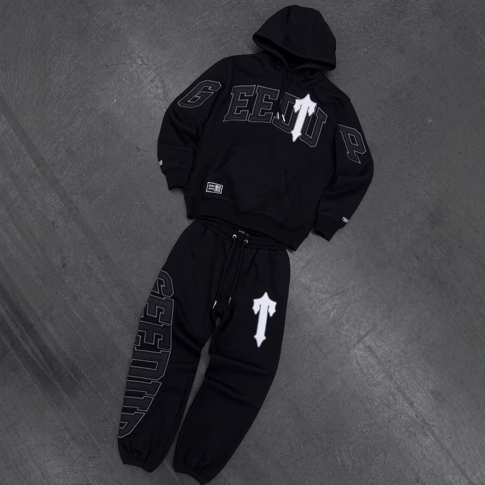 Nueva marca de moda europea y americana traje de suéter estampado de otoño e invierno personalidad calle suelta ropa deportiva casual al por mayor para hombres y mujeres