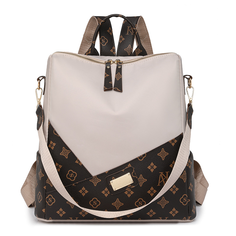 Comercio exterior al por mayor 2024 nueva moda europea y americana señoras mochila de nailon impresión color de contraste mochila de viaje de un solo hombro marea