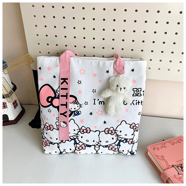 The new fashionable cartoon canvas bag, simple and versatile tote bag, cute commuting single-shoulder tote large bag, is selling well across borders undefined