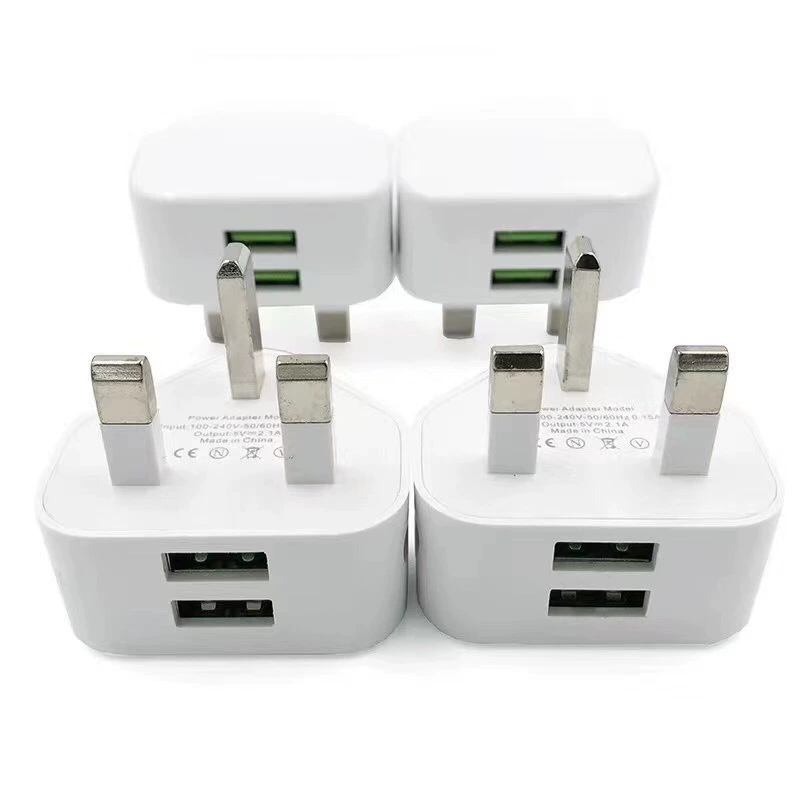 Зарядное устройство для мобильного телефона 5V1A, plug треугольный в стиле Британский - стиль Гонконг - адаптер с одной USB-розеткой