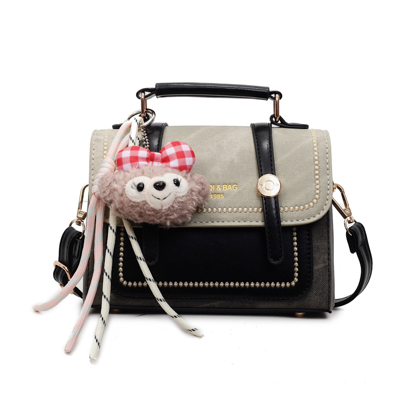 Bolso de mano doble estilo inglés de estilo extranjero 2025, otoño y invierno nuevo estilo de bolso de mujer relajado, bolso de hombro casual.