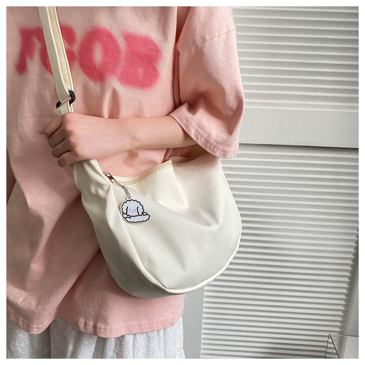 Large capacity canvas shoulder for women in spring summer 2023, new solid color, simple and fashionable casual bag,_voghion.com