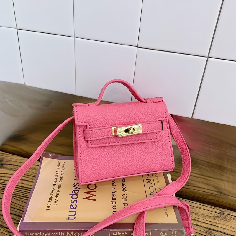 Bolso de hombro para niños y niñas de estilo coreano mini bolso de mensajero para padres e hijos de color sólido simple nuevo monedero con cerradura para niños