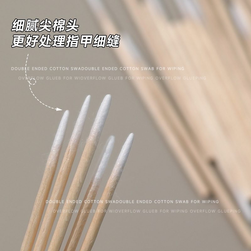ネイルアートは糊の先の綿棒の超細い木の棒を拭きます。|undefined