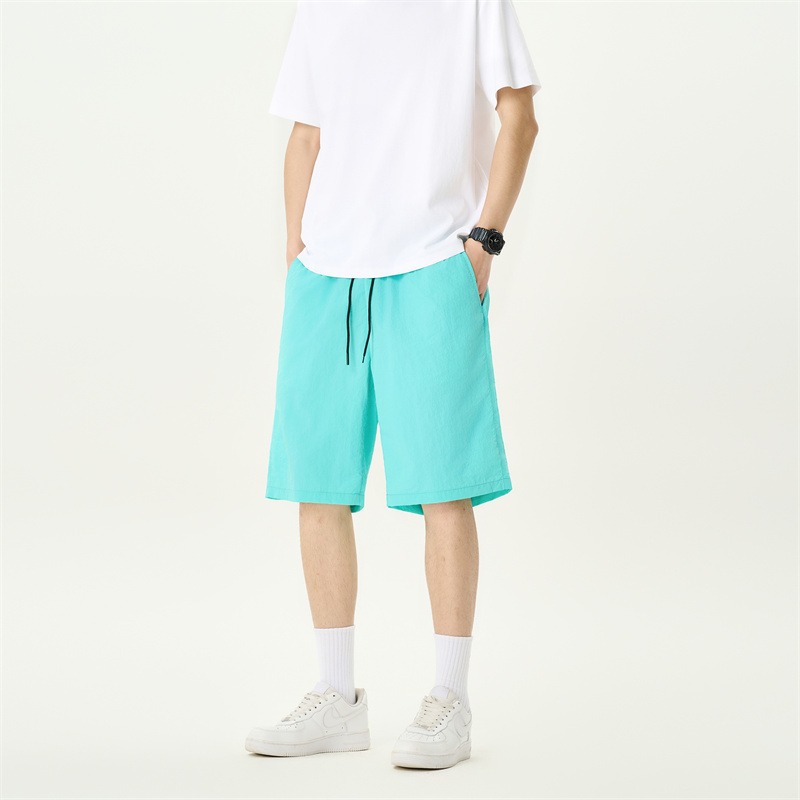 Camisas y menos ropa pantalones cortos casuales de verano seda de hielo para hombres, transpirable y de secado rápido, pantalones de cinco puntos sueltos para correr en deportes callejeros fritos