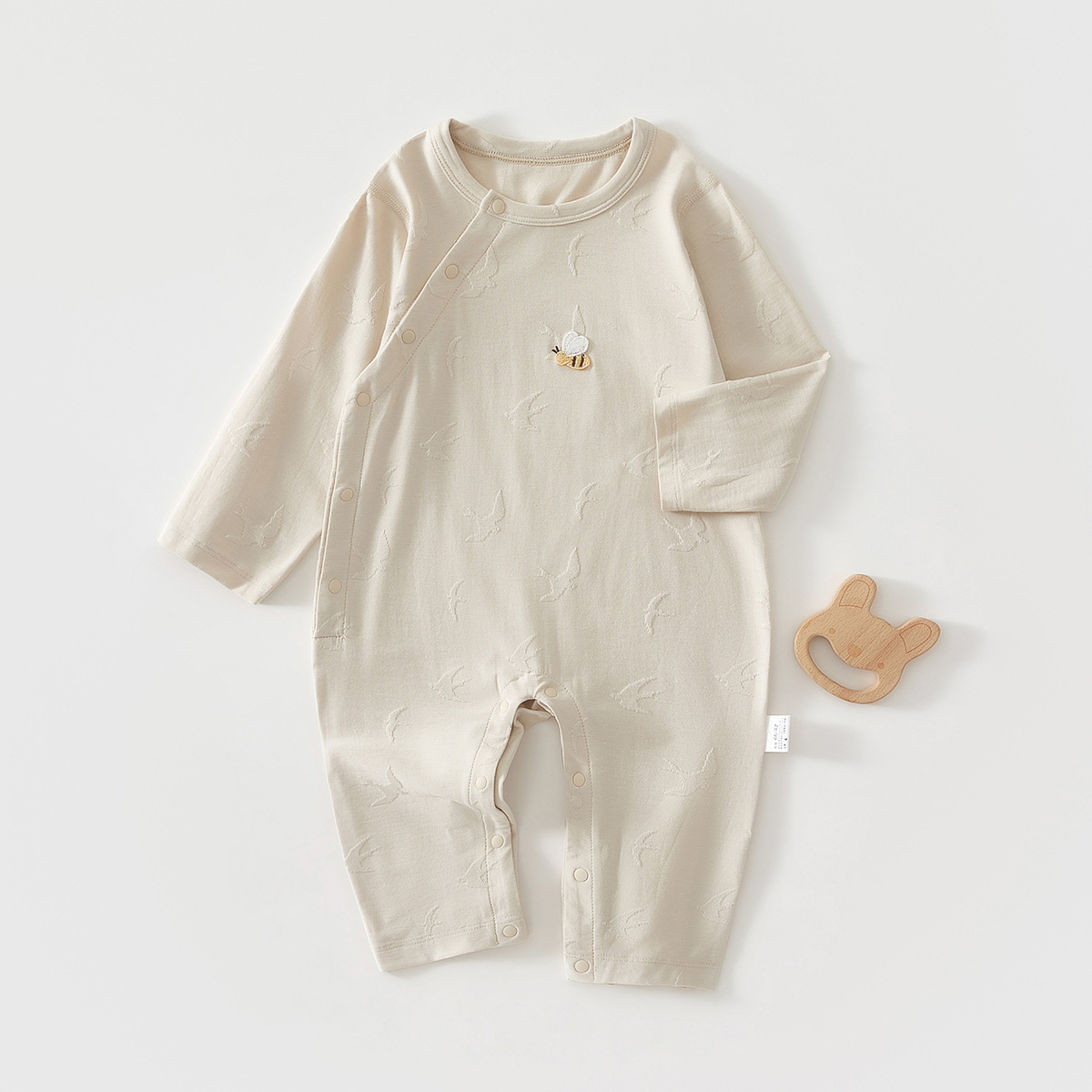 Primavera y verano nuevos productos de algodón Moti flor un estándar de manga larga baby pijama de colga inclinada baby overcoat