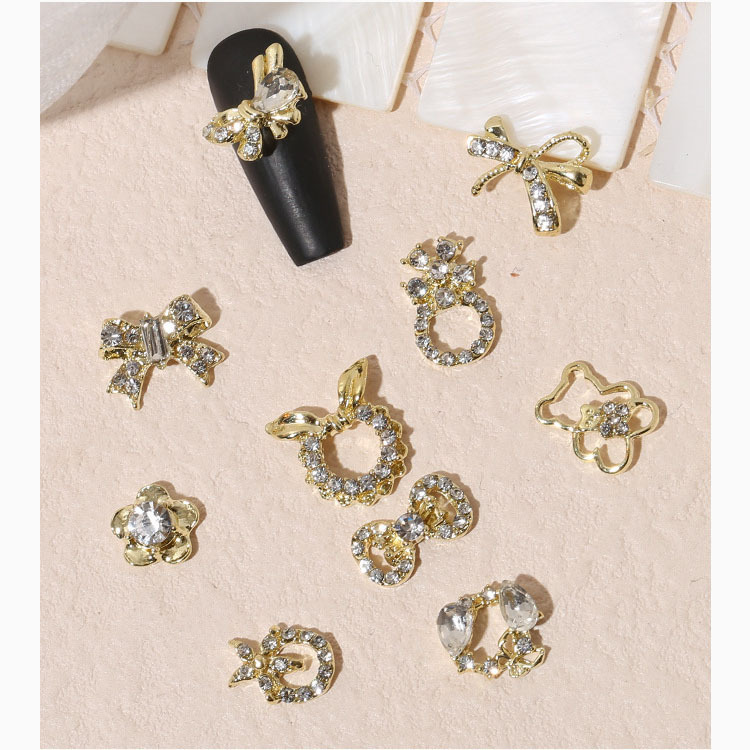 Overseas popular new bow alloy jewelry Pearl nail nail decoration moon flower butterfly nail drill