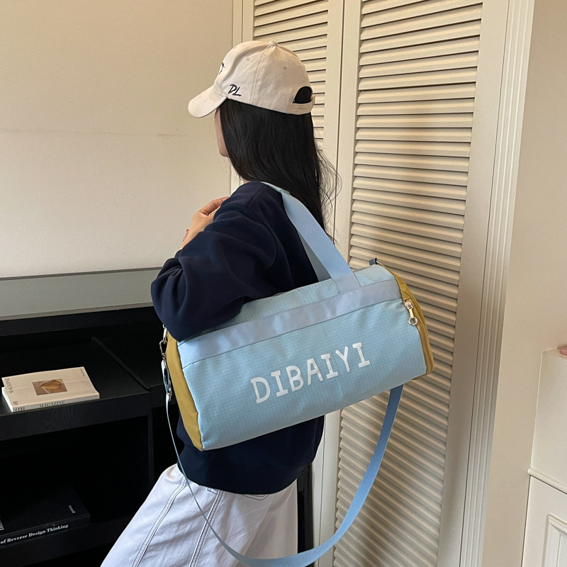 Fashionable color-blocked travel bag, trendy sports and fitness bag, single shoulder crossbody bag, dry and wet separation sports, swimming, and yoga bag